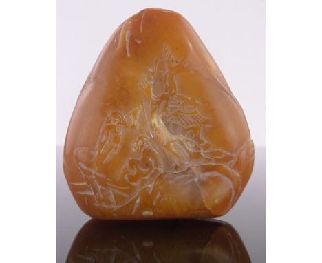 A Chinese yellow jade boulder,with relief carved figures and buildings, height 5.5cm.
