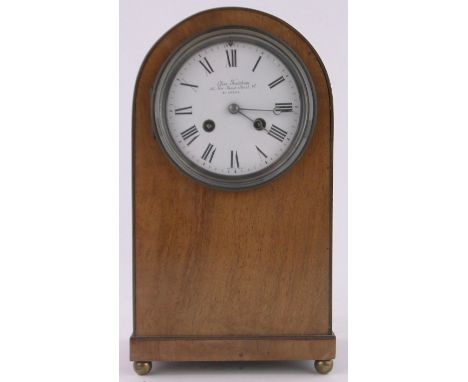 An Edwardian walnut cased domed top mantel clock,retailed by Charles Frodsham of New Bond Street, brass 8-day striking moveme