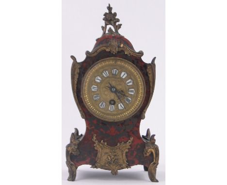 A 19th century tortoiseshell and brass boulle marquetry balloon cased mantel clock,embossed brass dial with enamelled numeral