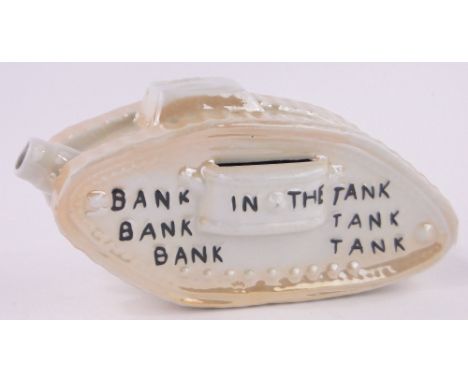 A First War period ceramic tank design money bank,length 15.5cm.