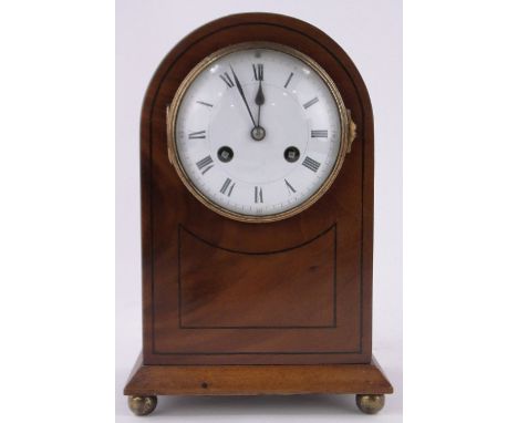 An Edwardian mahogany domed top mantel clock,enamelled dial and 8-day striking movement, height 26cm.