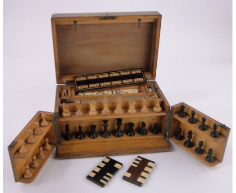 A Victorian pine games compendium,with original chess set, King height 7cm, cribbage board, etc., case width 32mm.