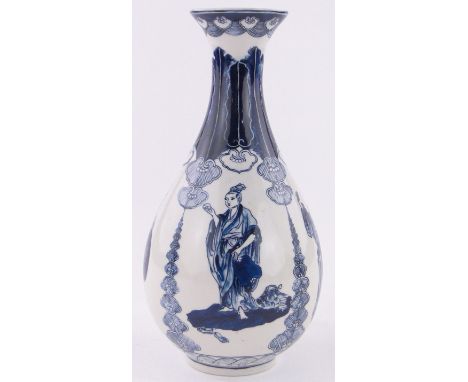 A European blue and white ceramic narrow necked vase,hand painted Oriental figures, height 26cm.