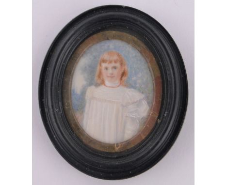 A miniature watercolour on ivory,portrait a young girl circa 1900, unsigned, image 6cm x 4.5cm, framed.