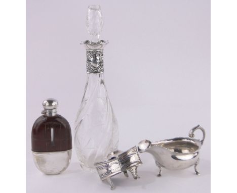 A group of silver and plated items,including silver sauceboat, silver mounted decanter, plated hip flask and plated salt, (4)