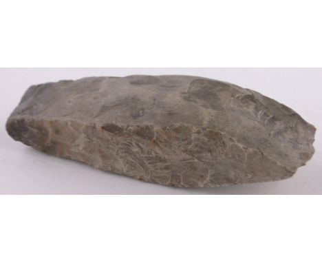 A flint hand axe,length 14cm.