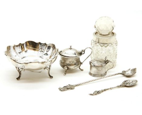 Silver items comprising, a pierced bowl, 11cm diameter, two mustards, silver mounted jar and two spoons