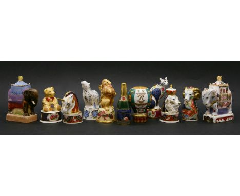 A collection of various Royal Worcester porcelain candlesnuffers, to include limited edition heraldic beasts, a hot air ballo