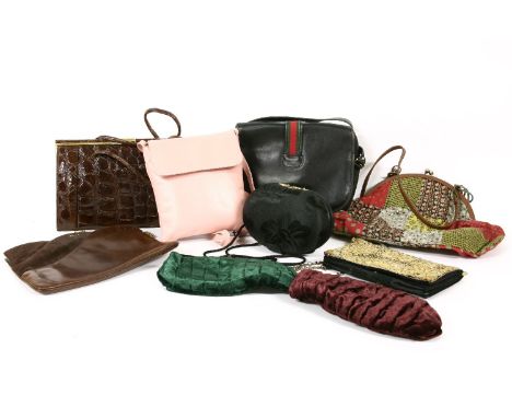 A collection of vintage handbags, including a 1950s brown leather crocodile effect example, and a vintage Gucci handbag