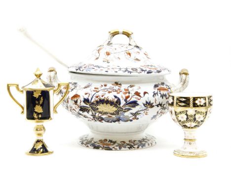 A large Spode soup tureen and cover, 25cm high, a ladle and a Spode drainer, 33cm long, decorated in the Imari style, four Ro