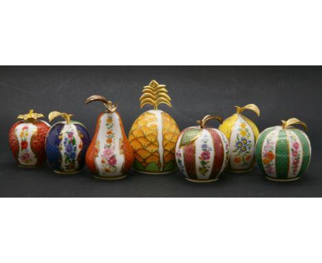 A collection of Royal Worcester 'The Connoisseur's Collection' porcelain, and gilt metal candlesnuffers in the form of fruit,