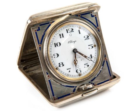 A SILVER AND ENAMEL SWISS TRAVEL CLOCK, TIFFANY & CO, 19TH CENTURYa triangle fold in a rectangular setting, the silver case d