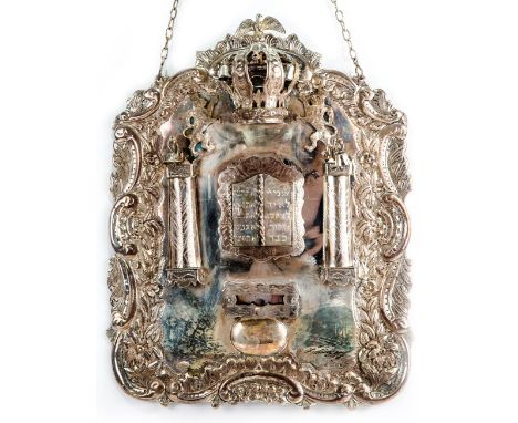 [JUDAICA] A POLISH SILVER TORAH SHIELD, PERLMAN, WARSAW, 19TH CENTURYfitted with a compartment containing a miniature Torah s