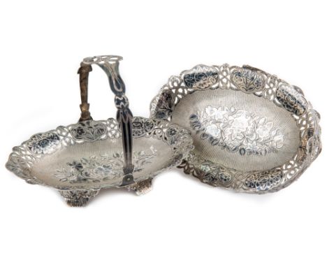 A PAIR OF RUSSIAN SILVER AND NIELLO CAKE BASKETS, MARKED IA IN CYRILLIC, MOSCOW, CIRCA 1892each of oval form, with a swing op