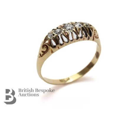 Antique 18ct gold five stone diamond ring. The ring set with approx 13 pts of old-cut dias and one rose-cut diamond (replacem