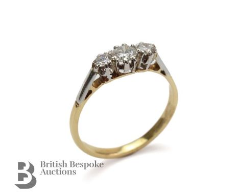 18ct yellow gold three-stone diamond ring, size L, the ring set with 32 pts of dias, approx 2.1 gms.&nbsp;