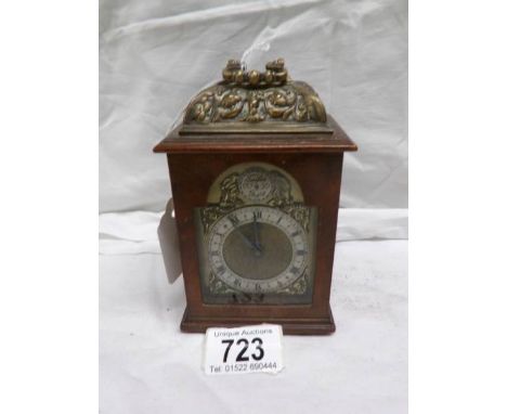 A wood cased carriage clock
 
This is believed to be overwound
The case &amp; dial are good but does have a light ‘heat’ rela
