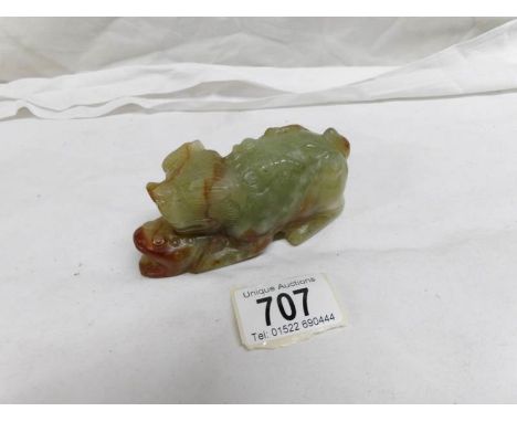 A Jade Chinese Dog of Foo adorned with a frog, snake and various insects, approximately 4.5" long