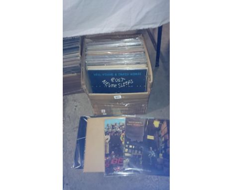 A box of progressive rock LP records including The Who, Beatles, Neil Young etc
 
 
10 records chosen at random
Varying condi