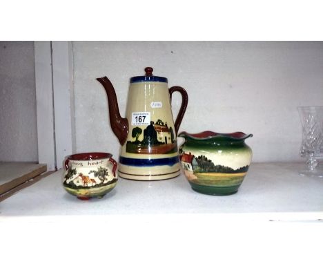 A Torquay pottery coffee pot and 2 other items
 
This is in fair condition
There is a slight chip to the coffee pot spout and