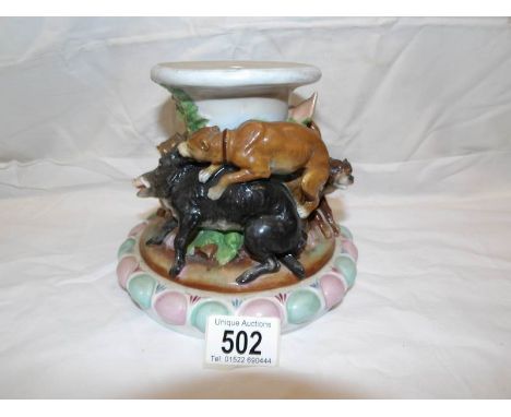 A Victorian ceramic ham stand surmounted wild boar and hounds