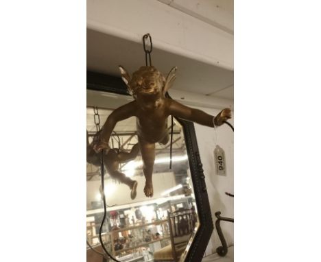 A hanging cherub light