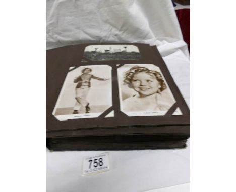 An album of in excess of 280 postcards including Shirley Temple, Fox hunting, Edward VIII etc