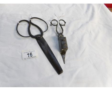 A pair of 19th century bonsai trimmers and a pair of 19th century oil lamp wick trimmers