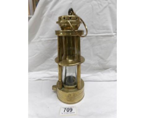 A rare 19th century brass miner's lamp marked Davis Derby