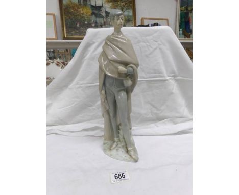 A NAO figure of a man in cloak