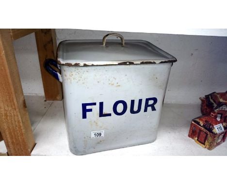 An enamel flour bin