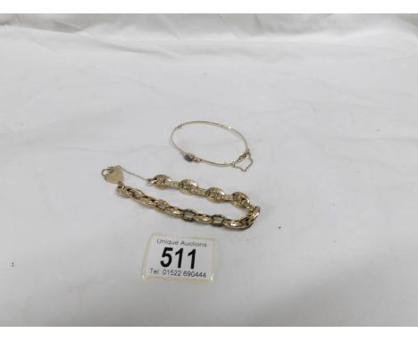 A 9ct gold sapphire and diamond bangle and a 9ct gold gate bracelet with padlock