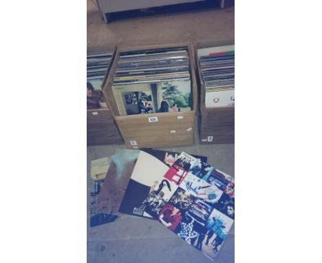 A box of classic rock LP records including  U2, Led Zeppelin, Pink Floyd, Rolling stones etc