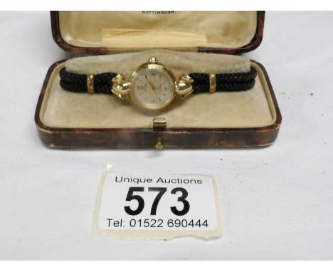 A Ladies Titus 17 jewel wrist watch marked on reverse TITUS 18 K Gold, Swiss made, 1501153
This is in working order, we have 