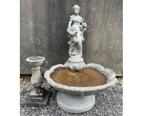 A reconstituted stone fountain with maiden surmount together with a reconstituted stone pedestal with sundial