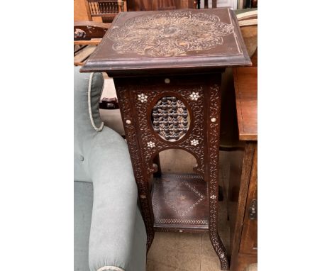 An Anglo Indian jardiniere of square form inlaid with mother of pearl with turned decoration 