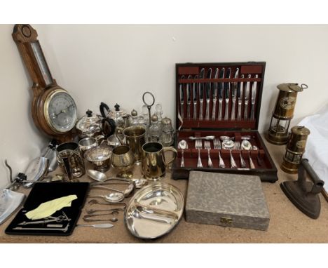 A cased electroplated part flatware service together with electroplated cruet set, four piece teaset, barometer, miners lamps