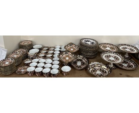 An extensive matched Royal Crown Derby 2451 pattern part tea set comprising twenty seven side plates, thirty two saucer dishe