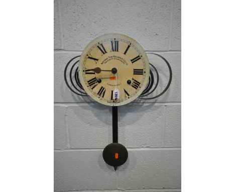 A TWIN SPRUNG WALL CLOCK, the enamel dial with roman numerals (condition report: untested, dial loose) (pendulum)