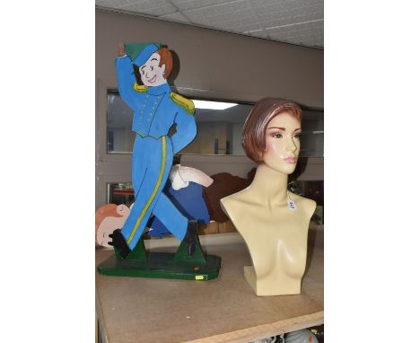 A TWENTIETH CENTURY MANNEQUIN BUST, the fibreglass female bust with painted hair and other features, height approximately 54c