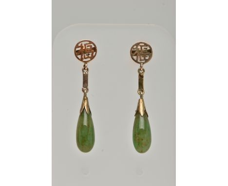 A PAIR OF JADE DROP EARRINGS, carved polished jade tear drops with yellow metal oriental designed surmounts, fitted with post