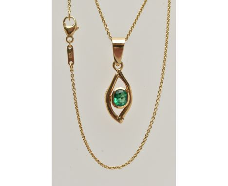 AN EMERALD PENDANT, oval cut emerald, bezel set with an open work mount, large tapered bail, stamped 18k, suspended from a fi