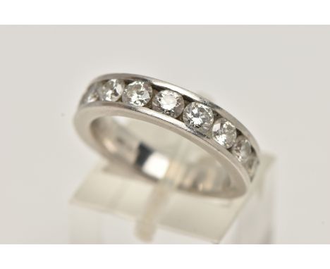 A WHITE METAL, DIAMOND HALF ETERNITY RING, channel set with ten round brilliant cut diamonds, estimated total diamond weight 