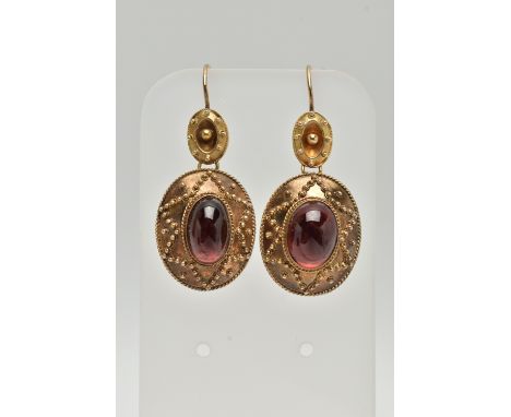 A PAIR OF VICTORIAN GARNET DROP EARRINGS, each of an oval form set with an oval cut garnet cabochon, applied bead work, fitte