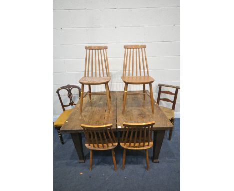 AN OAK DINING TABLE, on square tapered legs, width 123cm x depth 105cm x height 69cm, four Ercol style dining chairs, and two