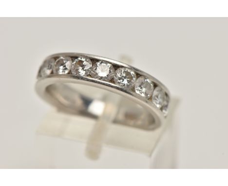 A PLATINUM DIAMOND HALF ETERNITY RING, channel set with ten round brilliant cut diamonds, estimated total diamond weight 1.50