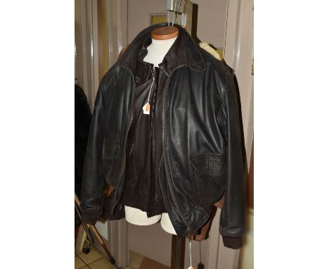 THREE MEN'S JACKETS, comprising two dark brown leather bomber style leather jackets, one made in England by Cirrus clothing w