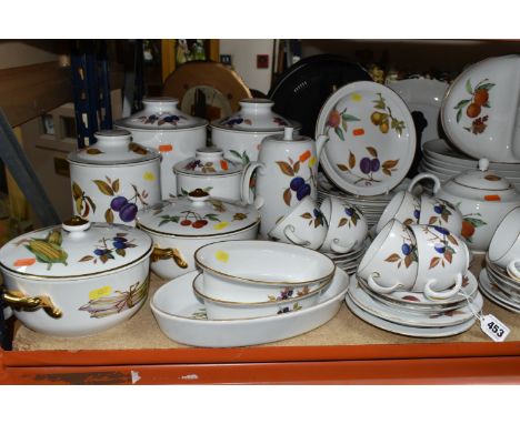 A LARGE QUANTITY OF ROYAL WORCESTER EVESHAM AND EVESHAM GOLD DINNERWARE, comprising four large kitchen storage cannisters, tw