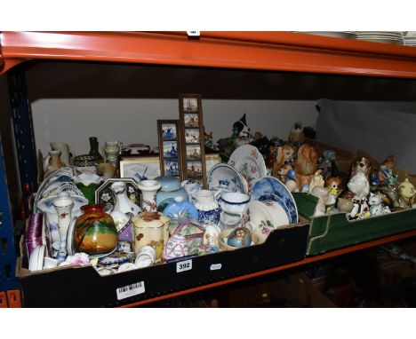FOUR BOXES OF CERAMICS AND ORNAMENTS, to include a quantity of bird and animal figurines, a Staffordshire style laughing cow,
