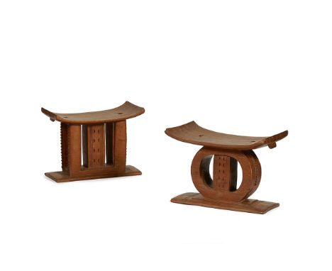 PAIR OF ASHANTI STOOLSGhanacarved wood, a pair of stools, both sitting on rectangular bases, one with a central supporting co